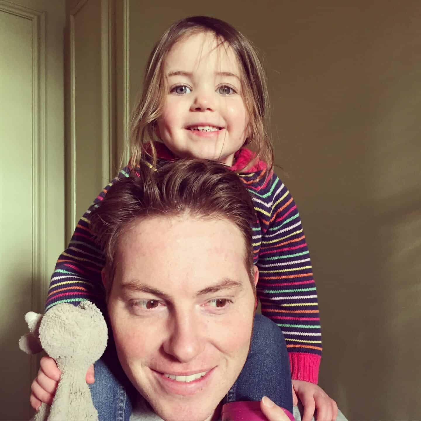 Thea on Ryan's shoulders