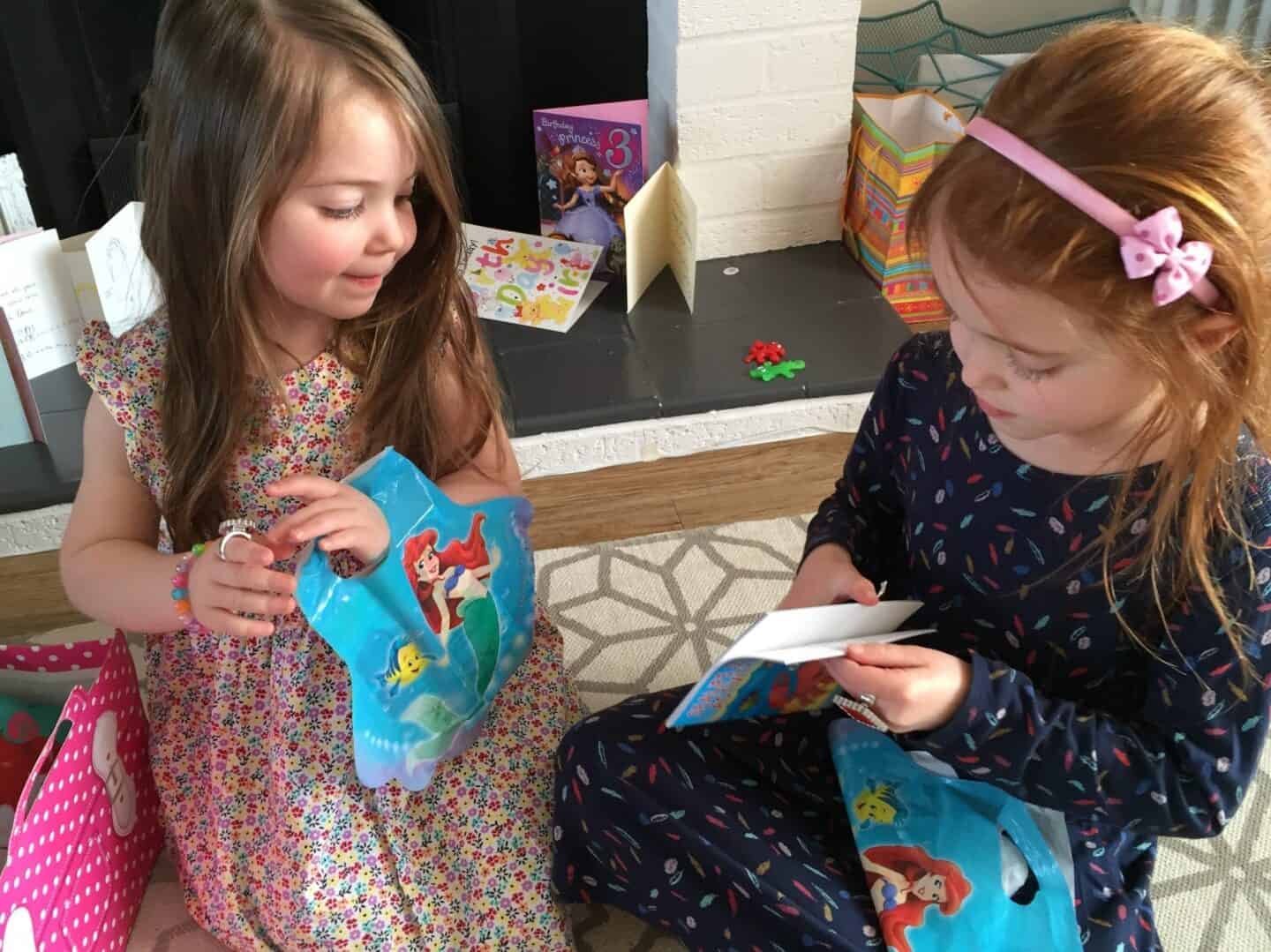 Thea and Ava opening their party bags from Party Bags & Supplies