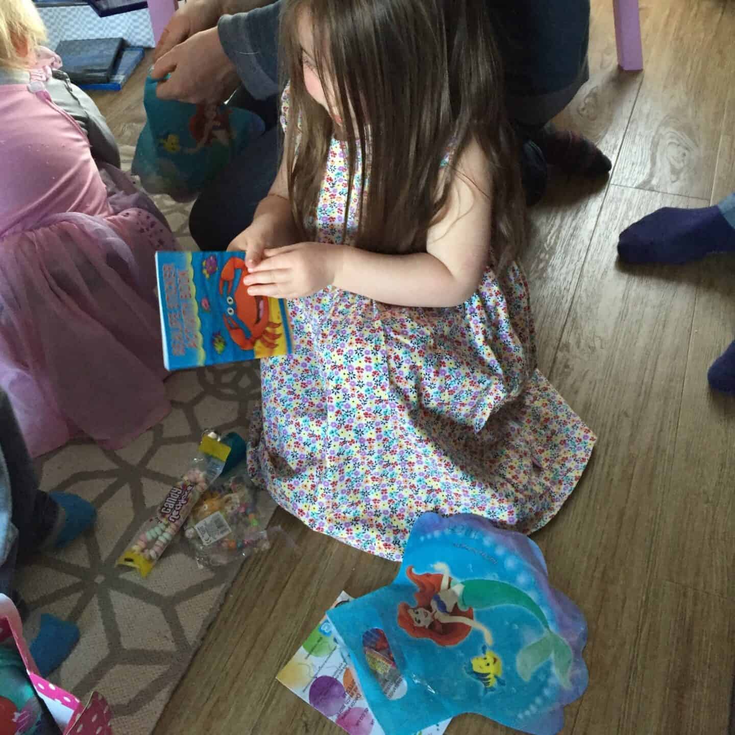 Thea opening her party bag from Party Bags & Supplies