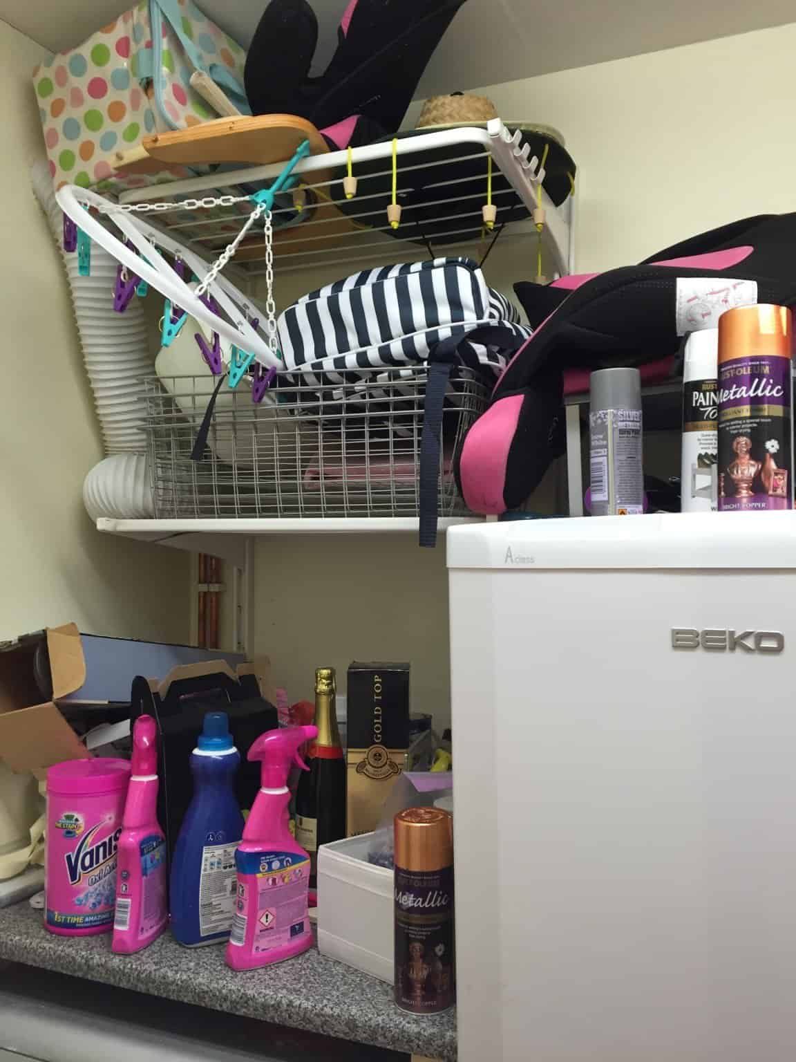 Junk-filled utility room shelves