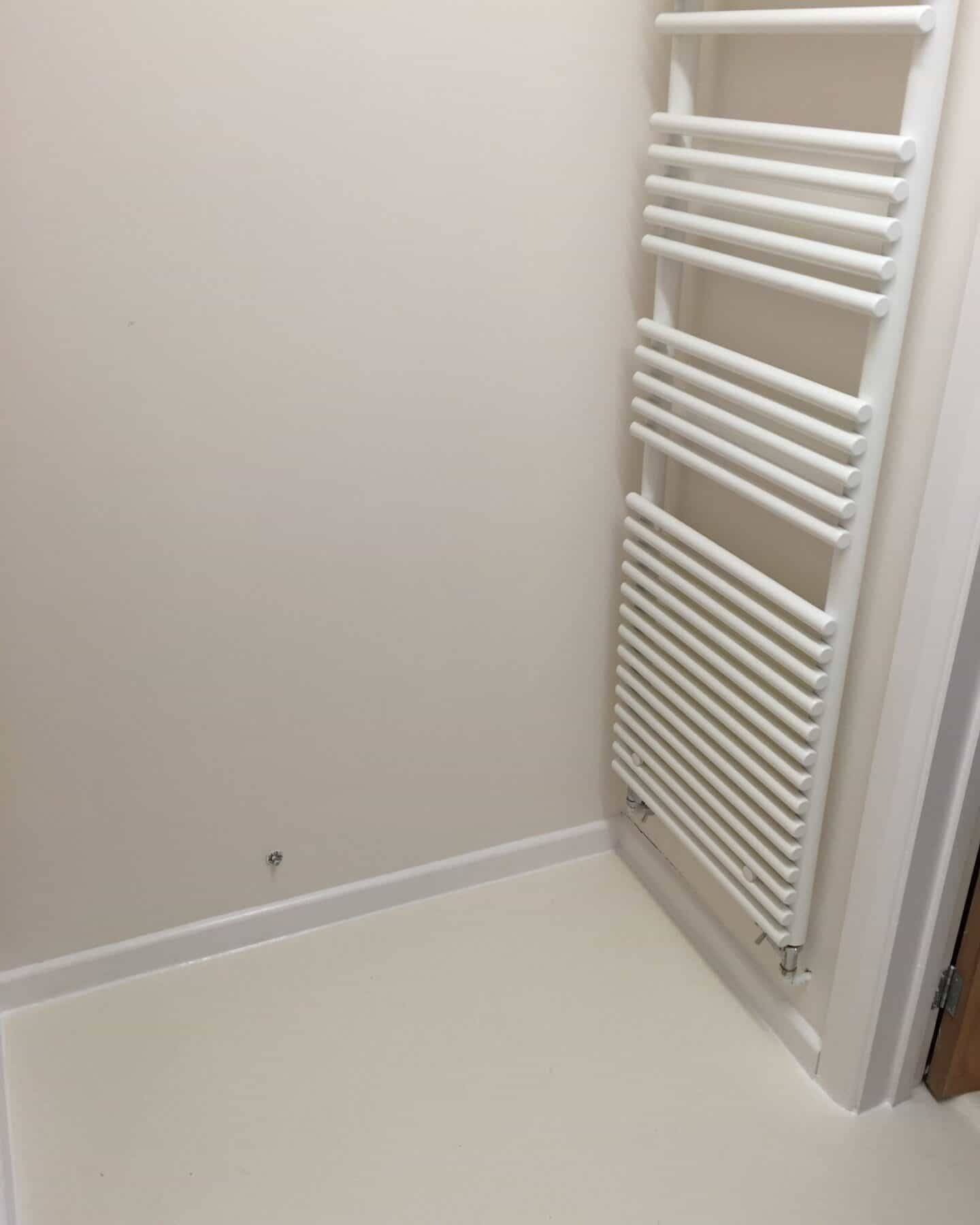 Utility room makeover with white radiator