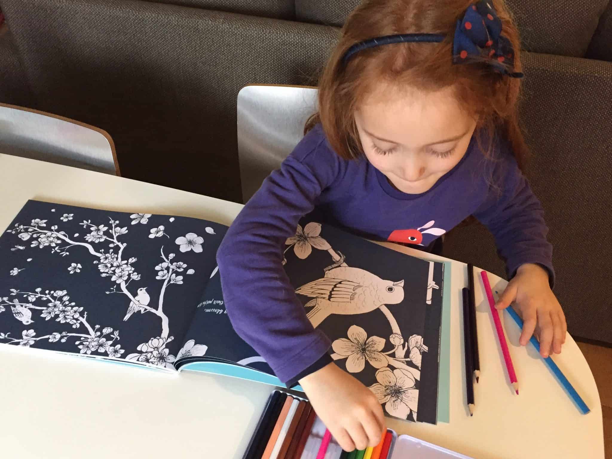 Ava getting ready to colour in her Colour Together colouring book