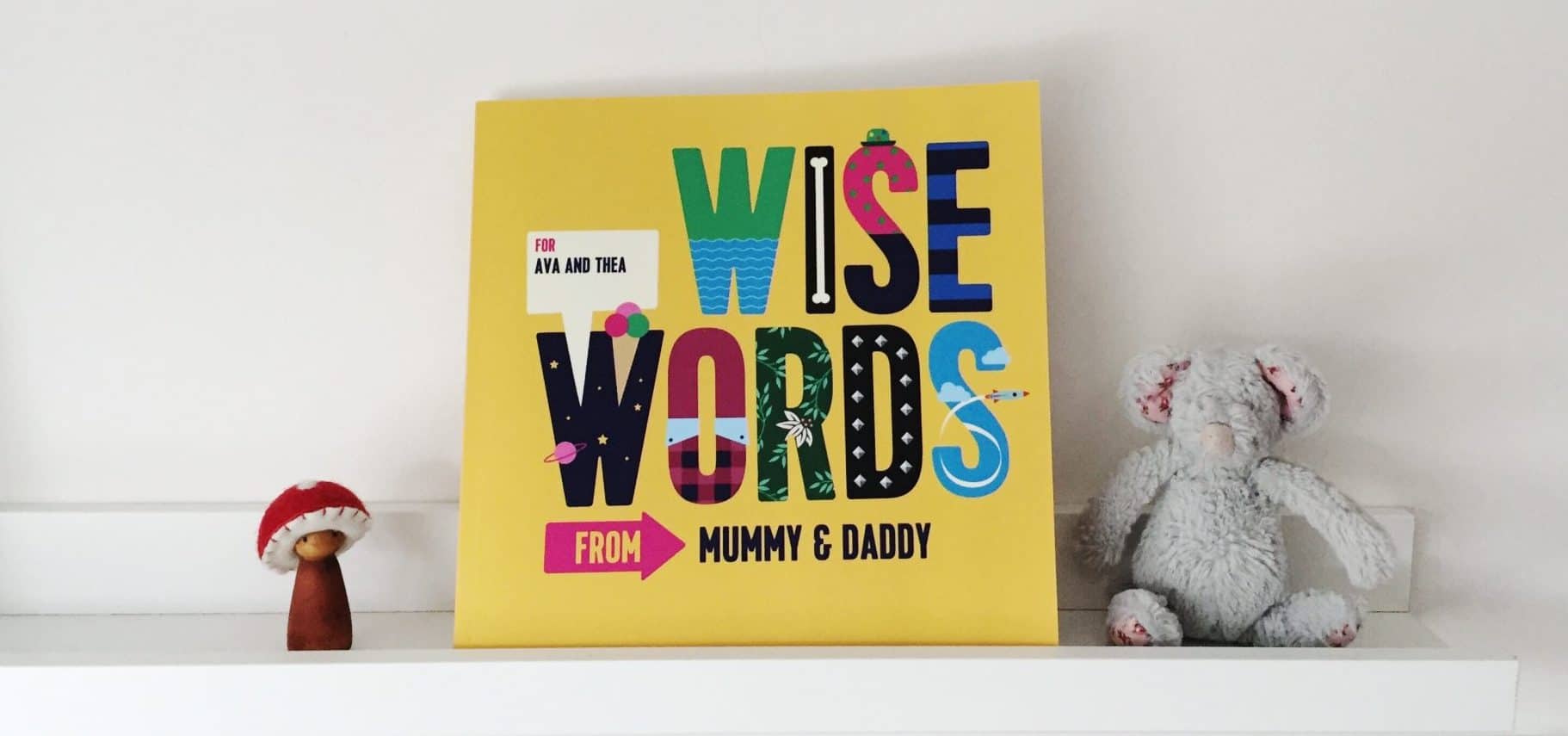 Wise Words personalised kid's book on a white shelf