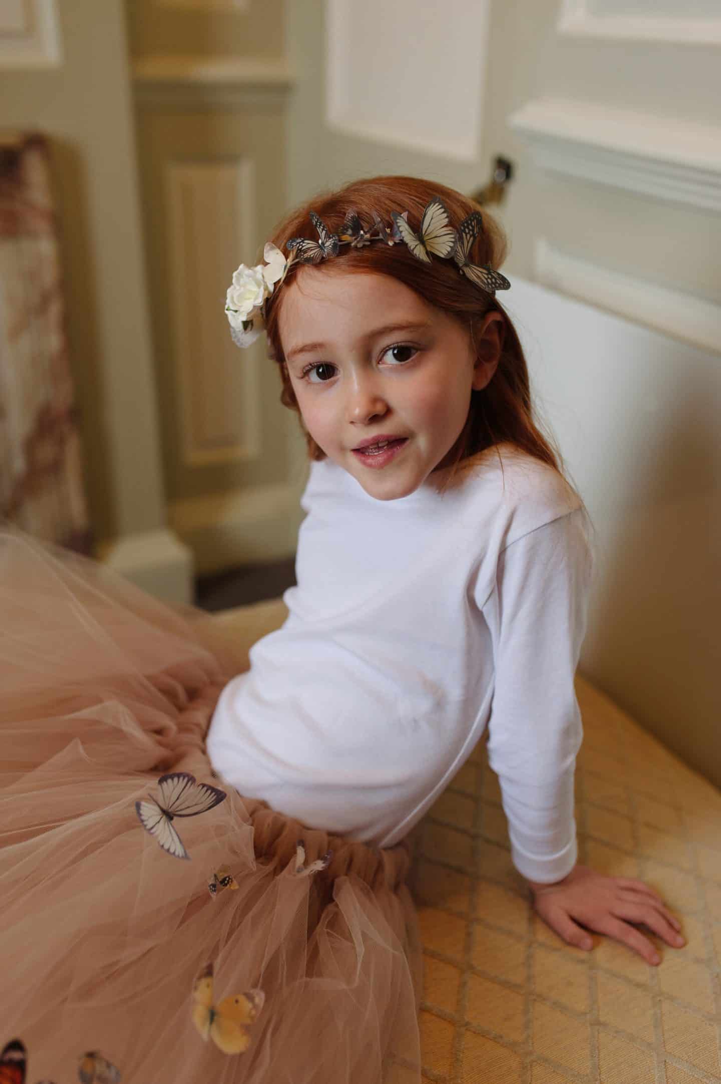 Ava in a Mimosa Bridal Butterfly Halo Headpiece