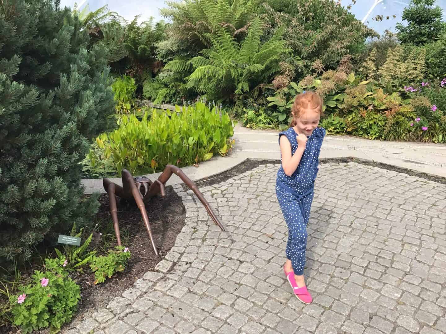 Ava running away from a giant spider