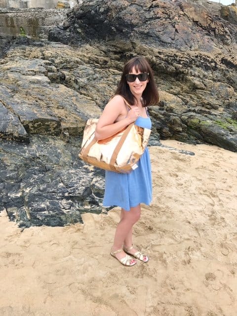 Rose Gold My Paper Tote being carried on a beach