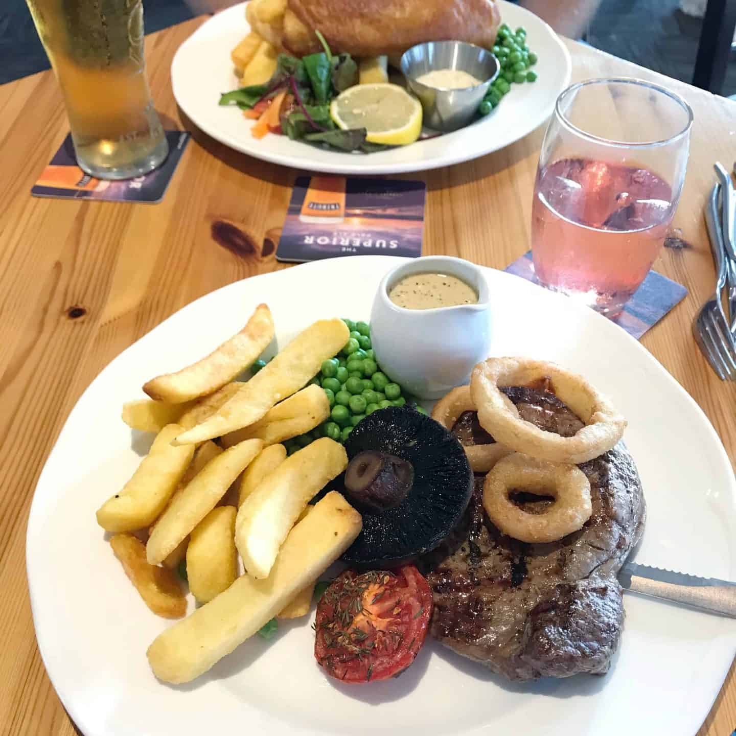 Steak and fish and chips from Woody's at Trevornick, near Newquay, Cornwall
