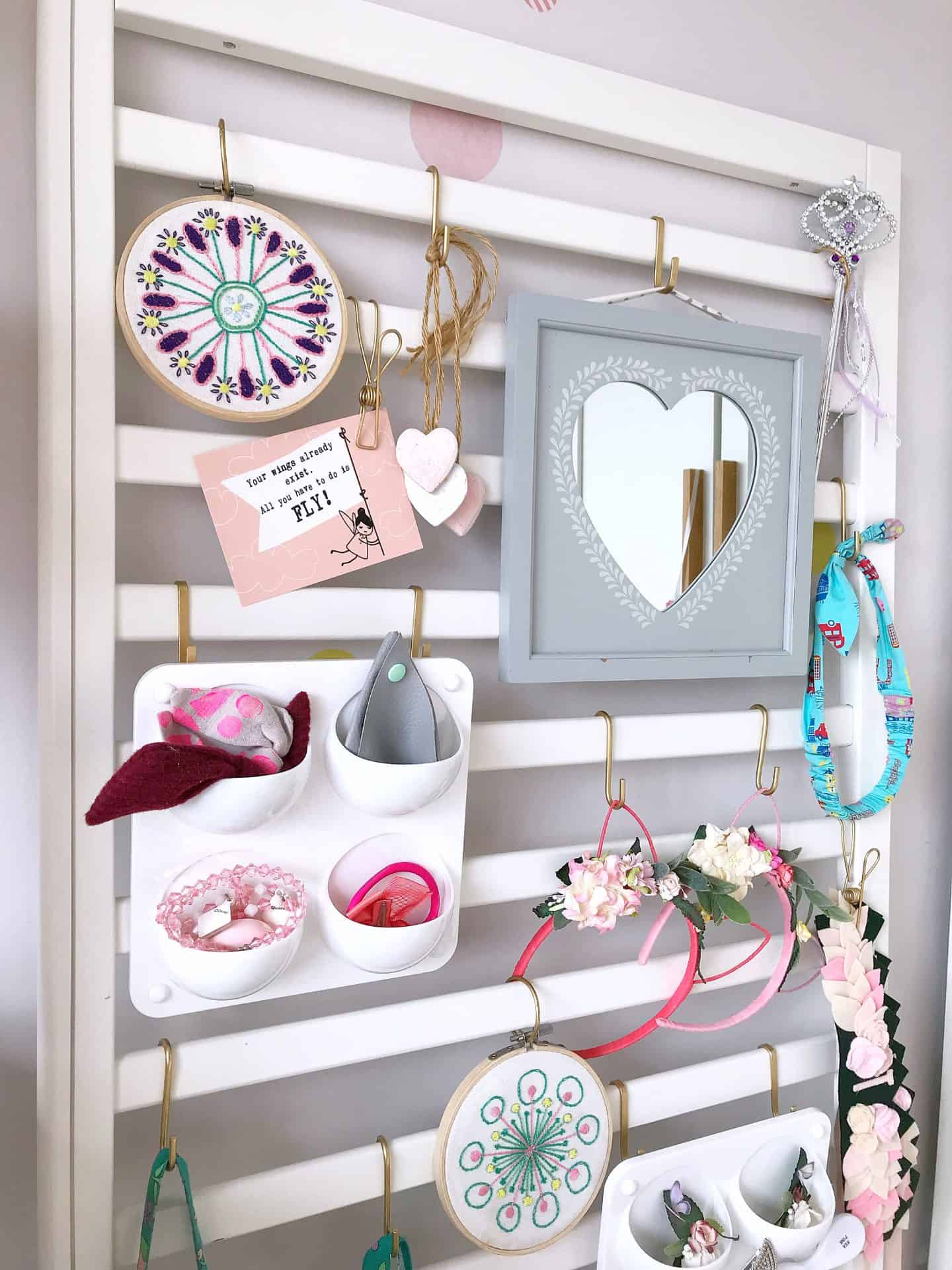 White accessories organiser made from an old cot side