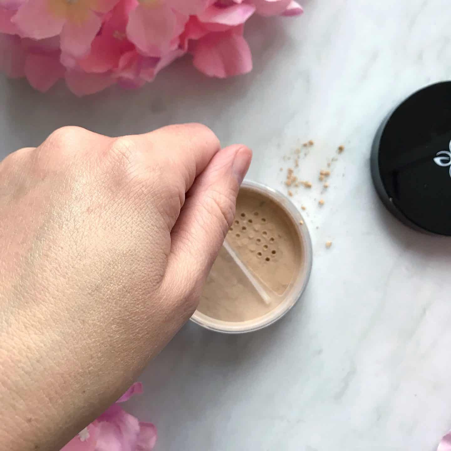Emani Vegan Cosmetics Perfecting Crushed Foundation smoothed in on hand