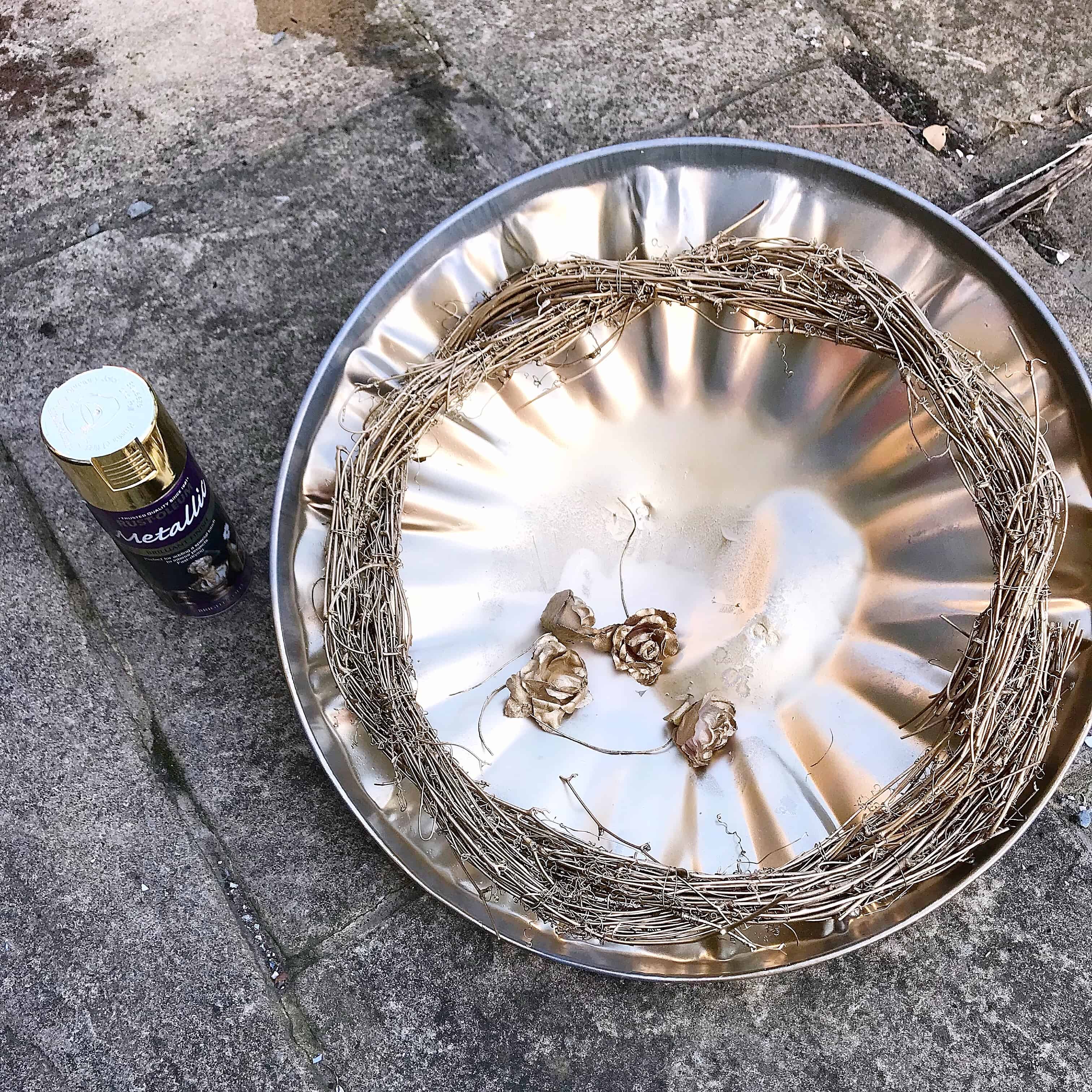 Step 1 to make an easy metallic wreath - spray it gold