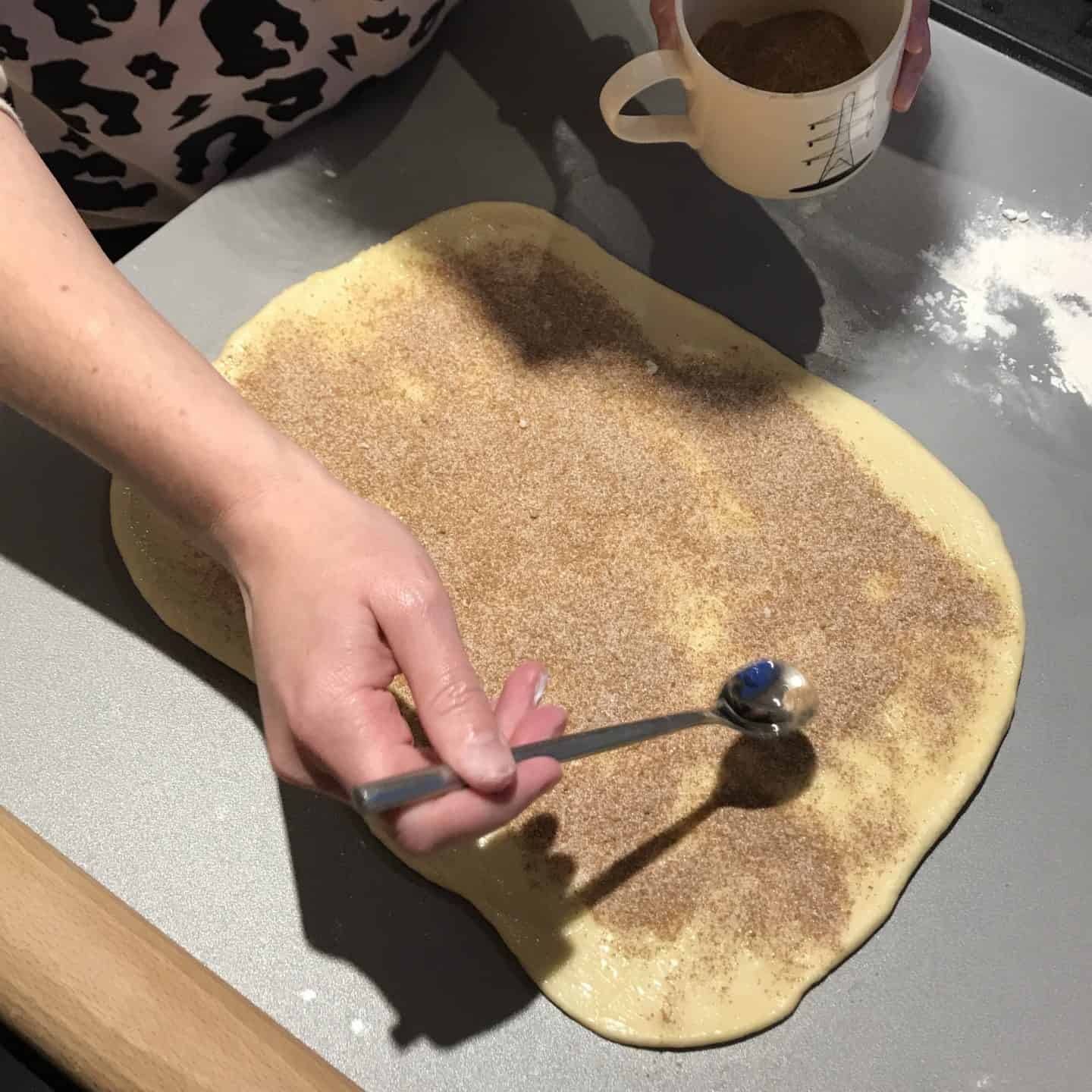 Making cinnamon rolls at home after our baking class
