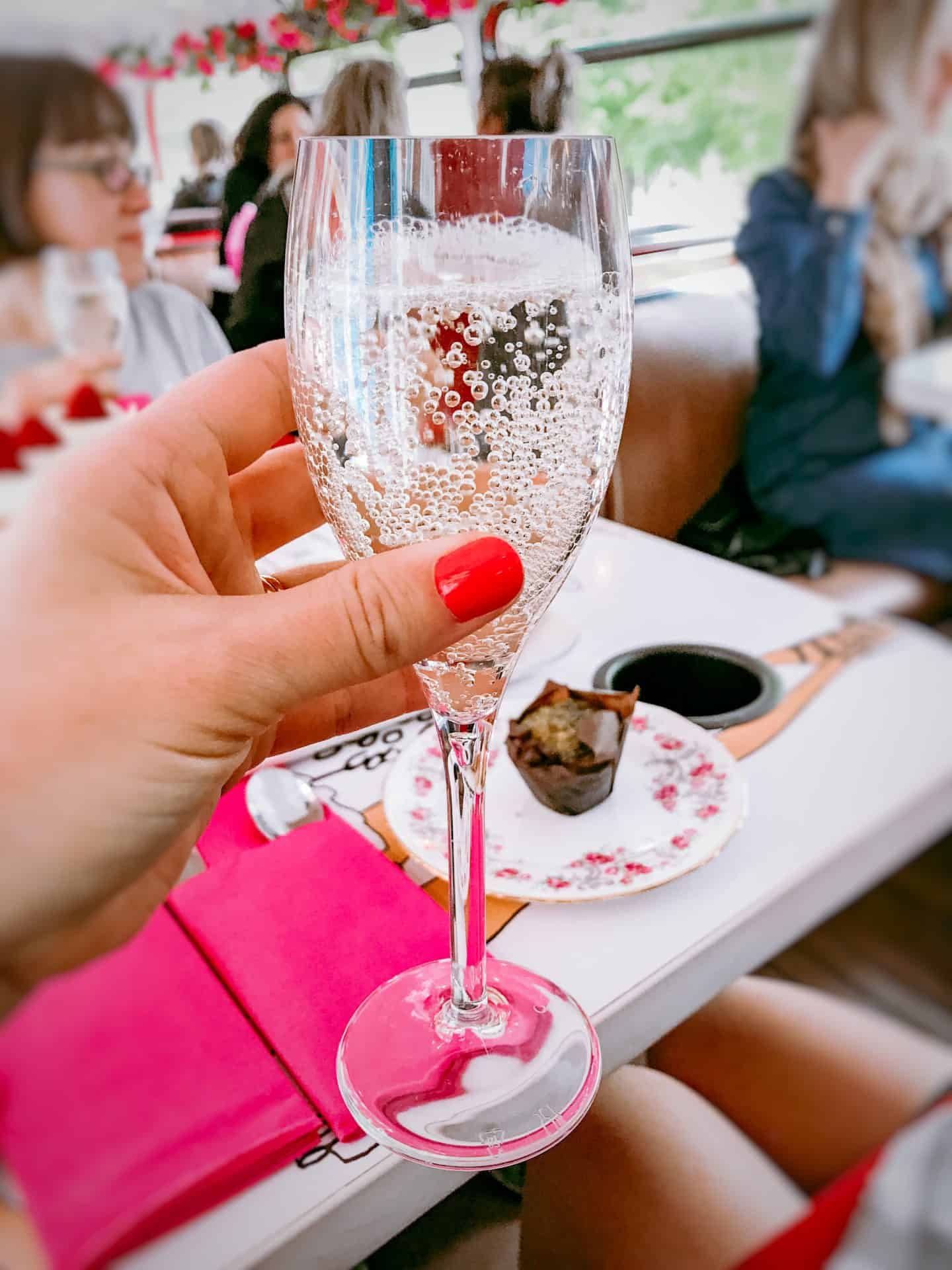 A (plastic) glass of Prosecco on board Brigit's Afternoon Tea Bus Tour by Brigit's Bakery
