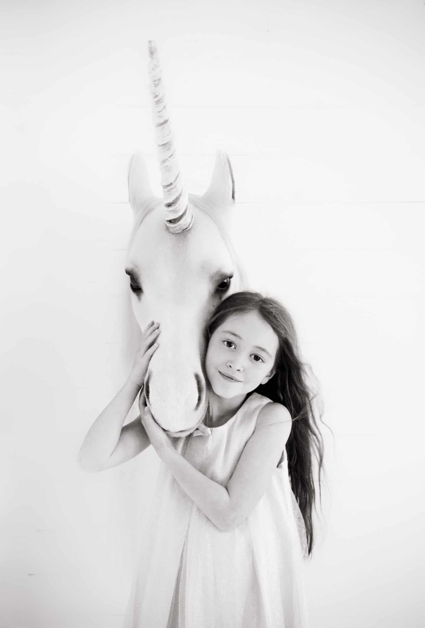 Ava and a unicorn photographed by Shaneen Rosewarne Cox