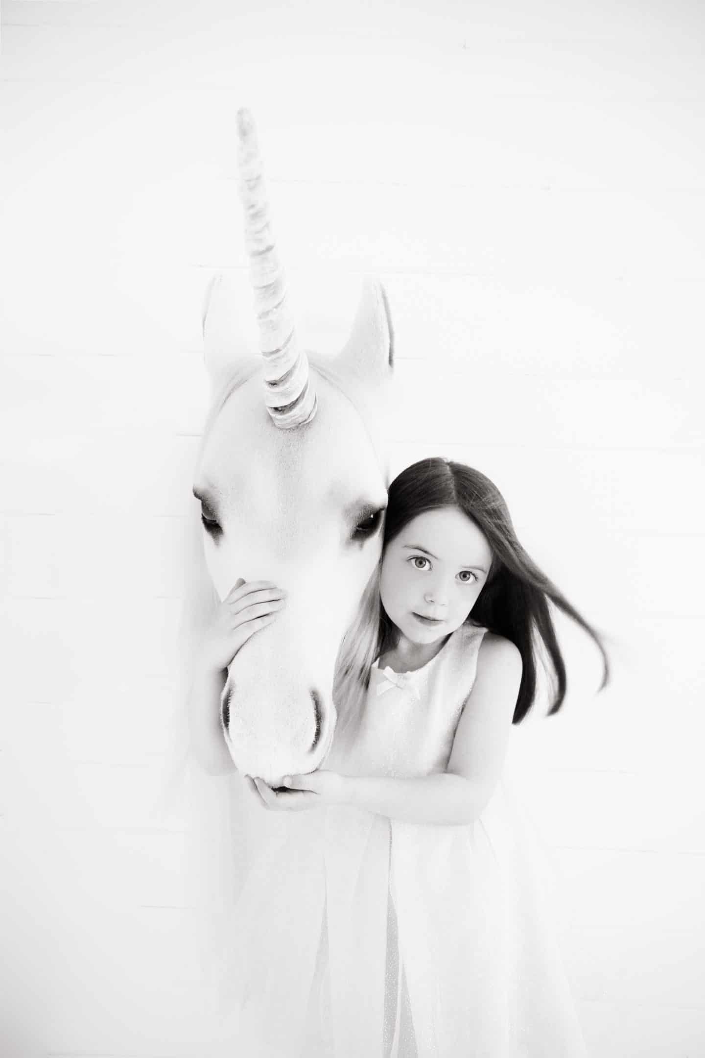 Thea and a unicorn photographed by Shaneen Rosewarne Cox