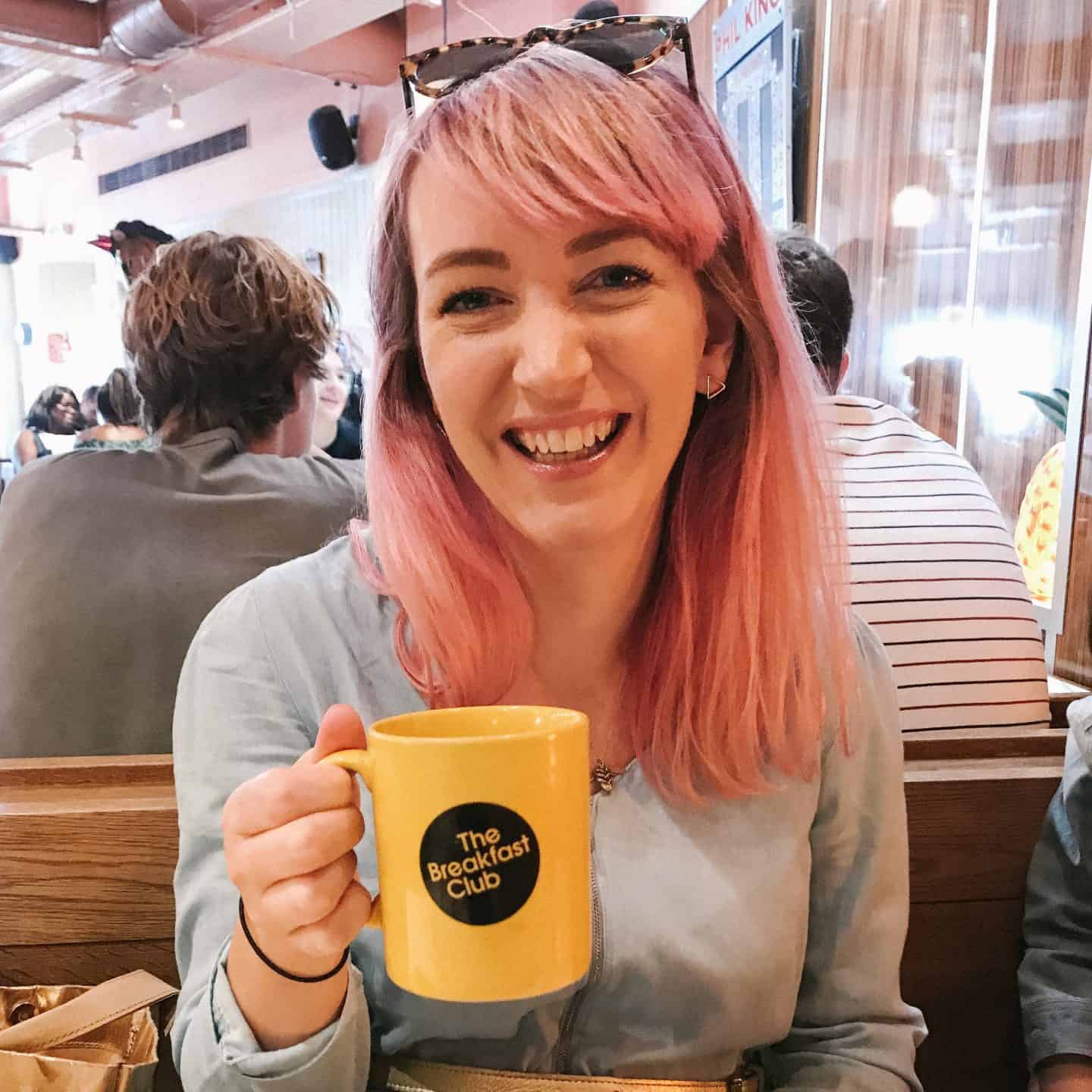 Enjoying-tea-at-The-Breakfast-Club-London