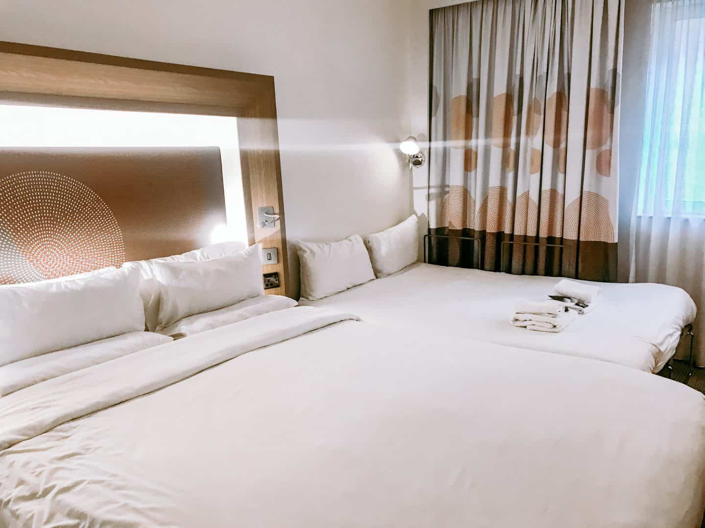 Queen bed and sofabed made into a double at the Novotel 