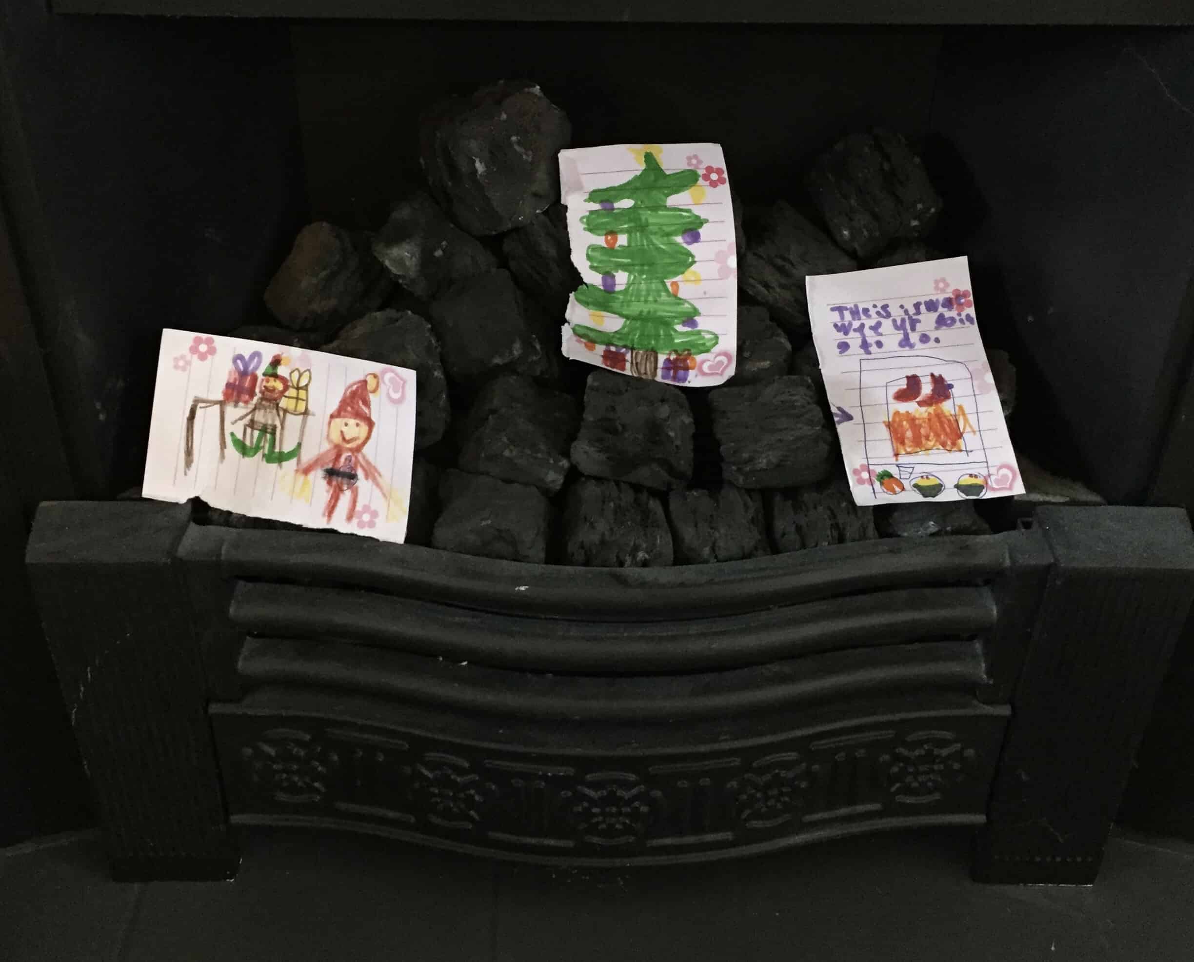 Christmas letters to Santa in the fireplace