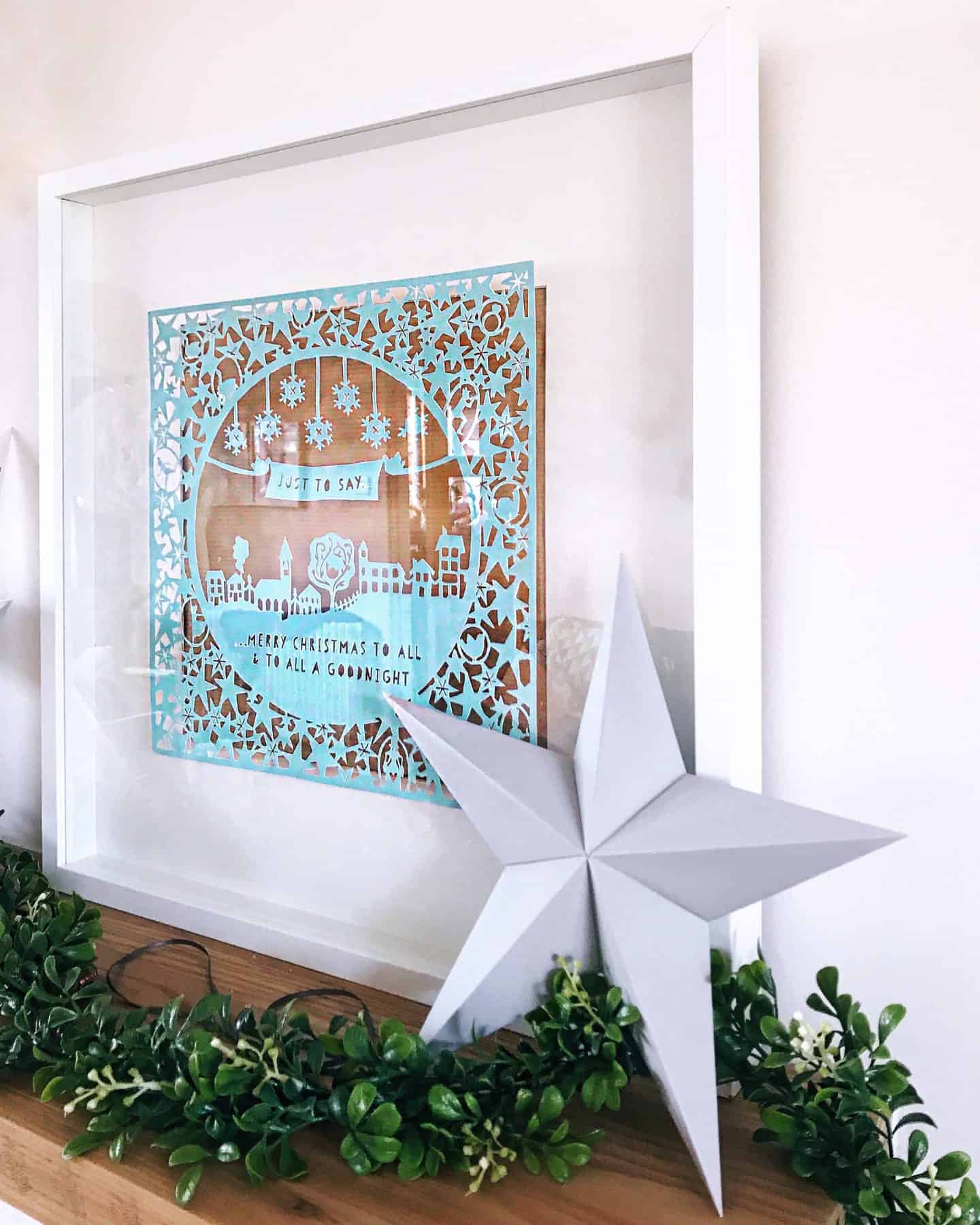 Origami star and Christmas Papercut