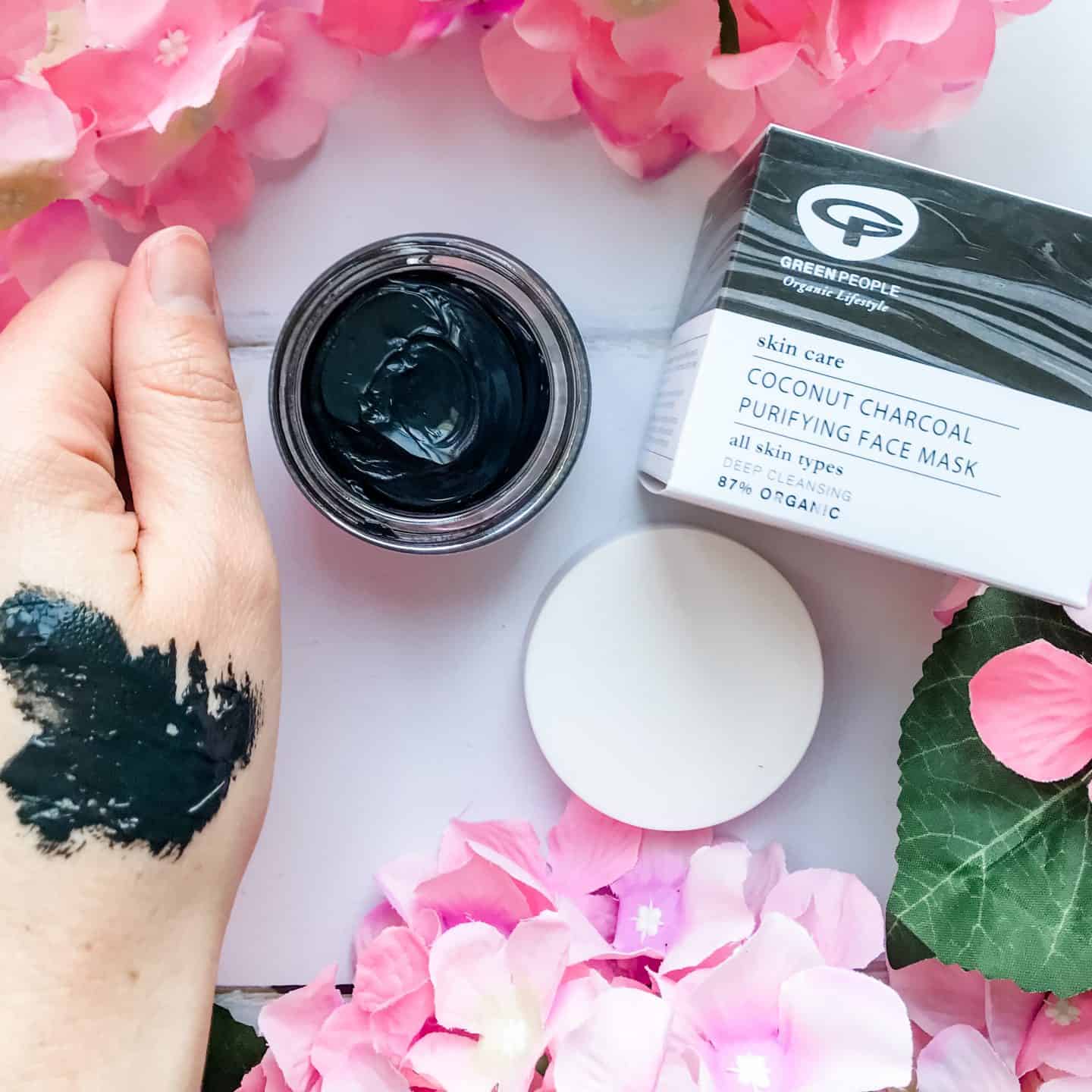 Green People Coconut Charcoal Purifying Face Mask swatch on hand