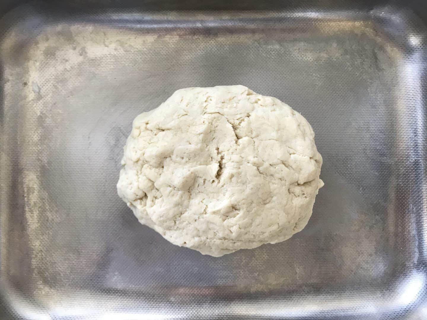 Easy no knead no yeast bread dough on a baking sheet