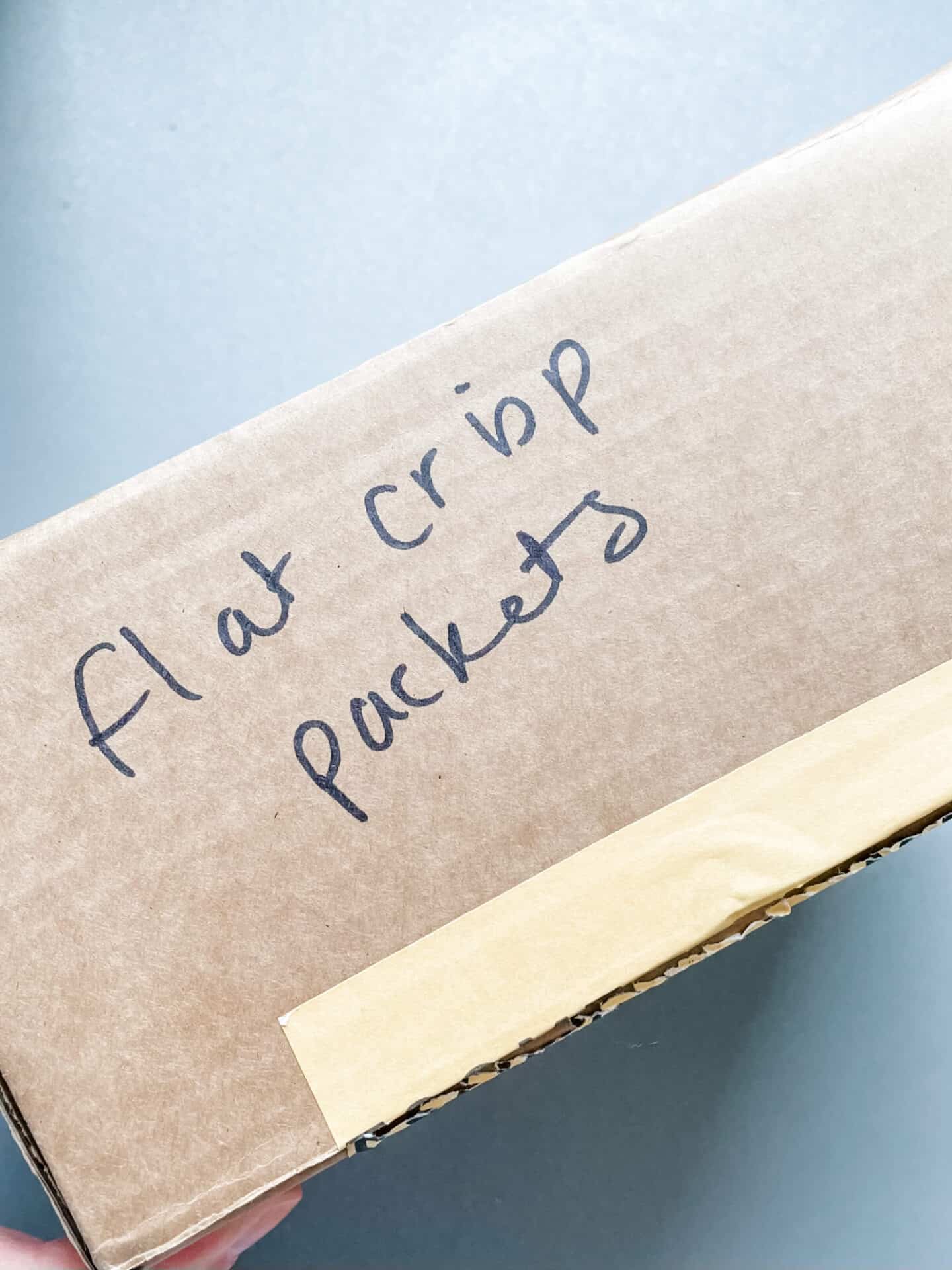 A box of crisp packets ready to recycle