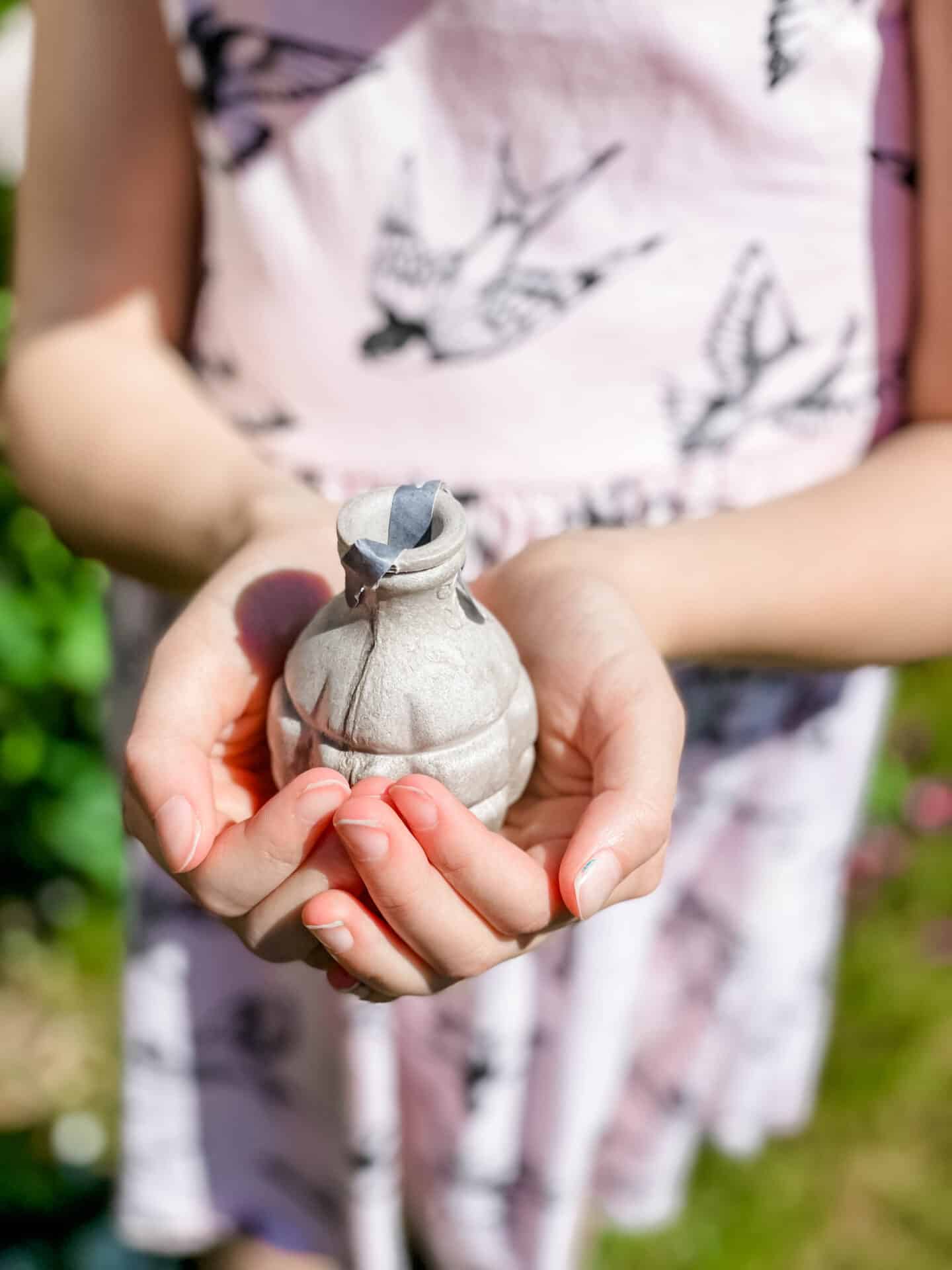 Girl holding a Kabloom Seedbom