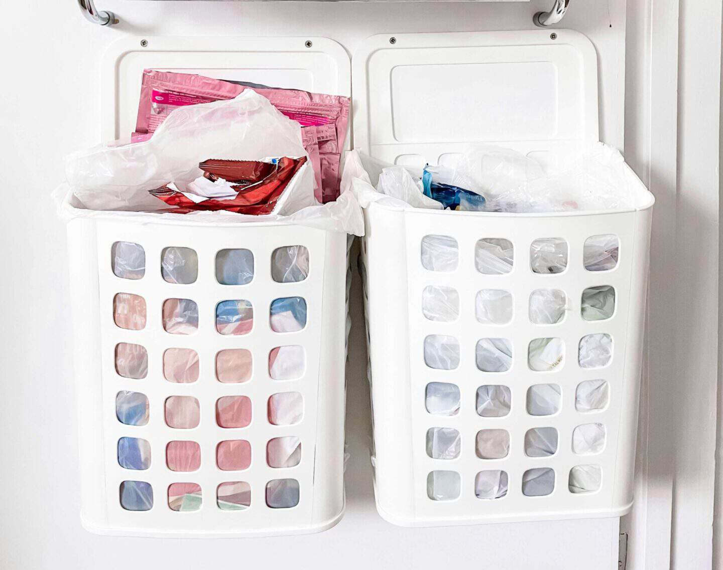 The inside of a cupboard door with areas to store soft plastic recycling before I take it to the supermarket
