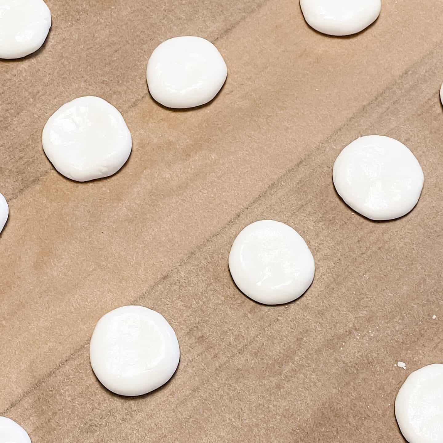 Homemade peppermint creams on unbleached baking parchment