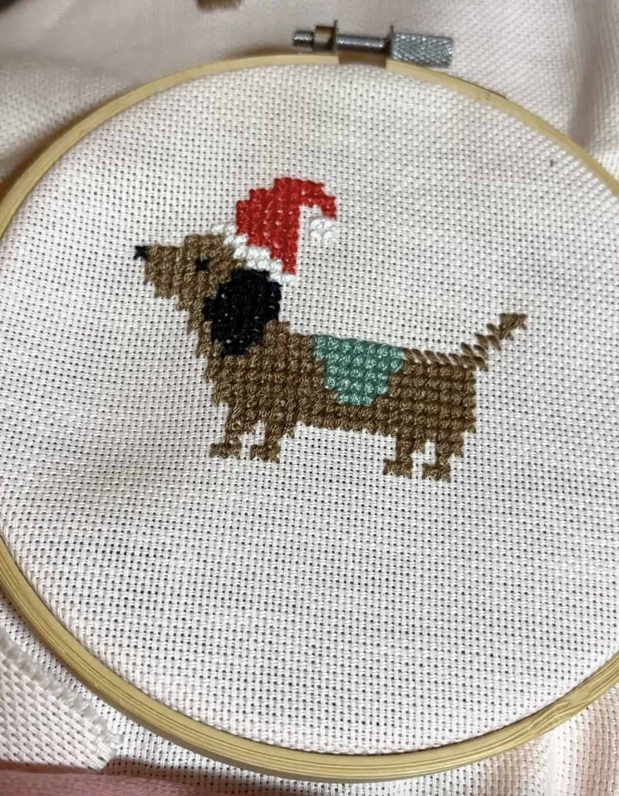 Festive Dachshund cross stitch in a hoop