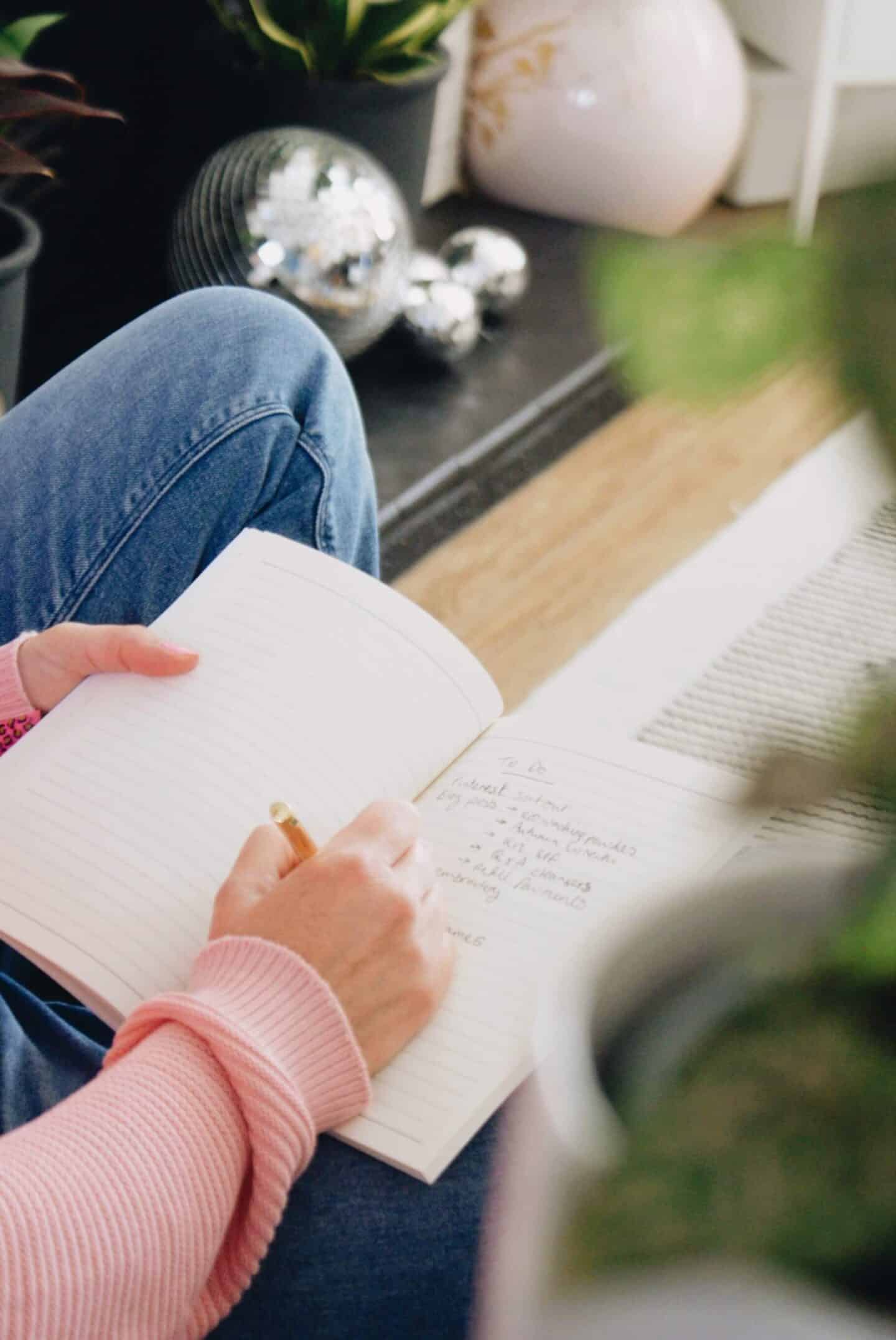 Becky writing in a notebook 