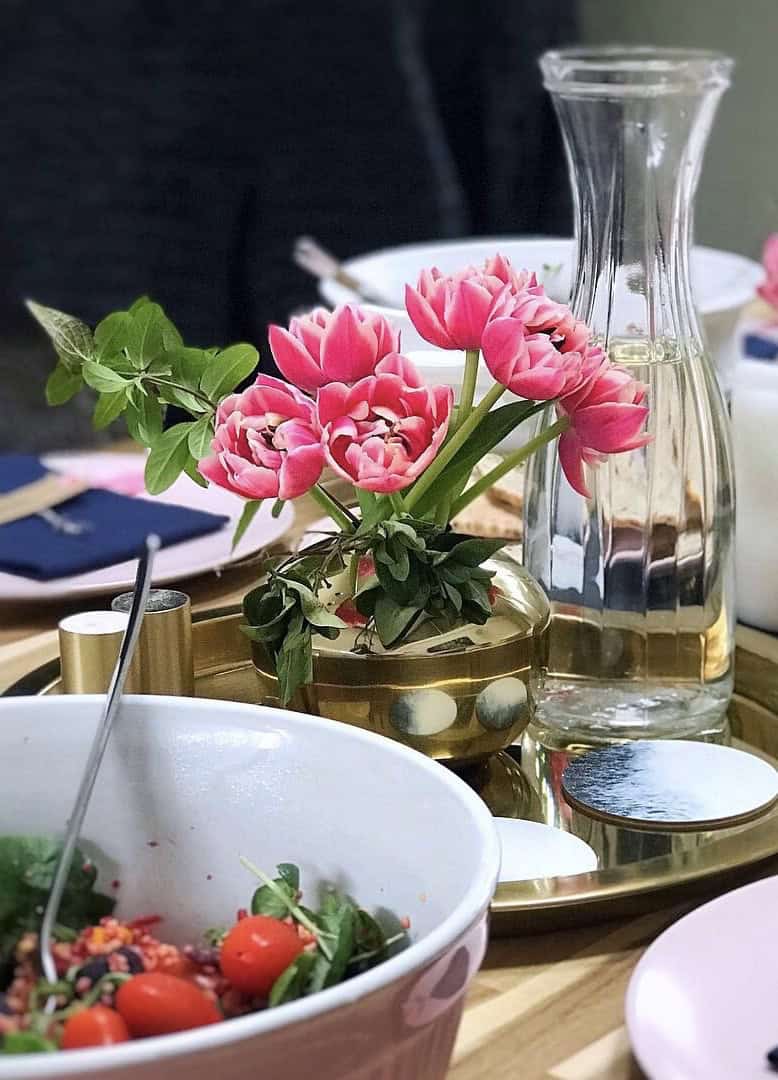 Tulips in a vase on a table